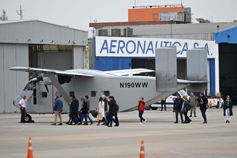 Relatives and victims of the dictatorship, and others, are given access to the Short SC-7 Skyvan aircraft used in the last Argentine military dictatorship as it sits on the tarmac at Jorge Newbery International Airport in Buenos Aires, on June 24, 2023.