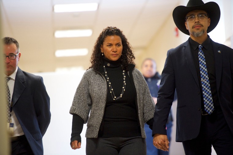 Bill Cosby accuser Lise-Lotte Lublin (C) walks through the Montgomery County Courthouse during a break from testifying on the fourth day of the sexual assault retrial on April 12, 2018 in Norristown, Pennsylvania. A former Temple University employee alleges that the entertainer drugged and molested her in 2004 at his home in suburban Philadelphia. More than 40 women have accused the 80 year old entertainer of sexual assault.