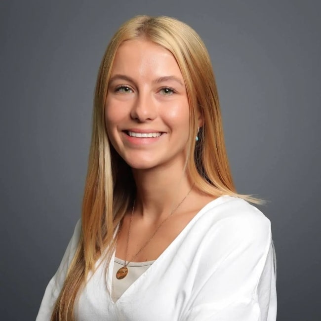 Princess Aisha bint Faisal as seen while smiling for a picture