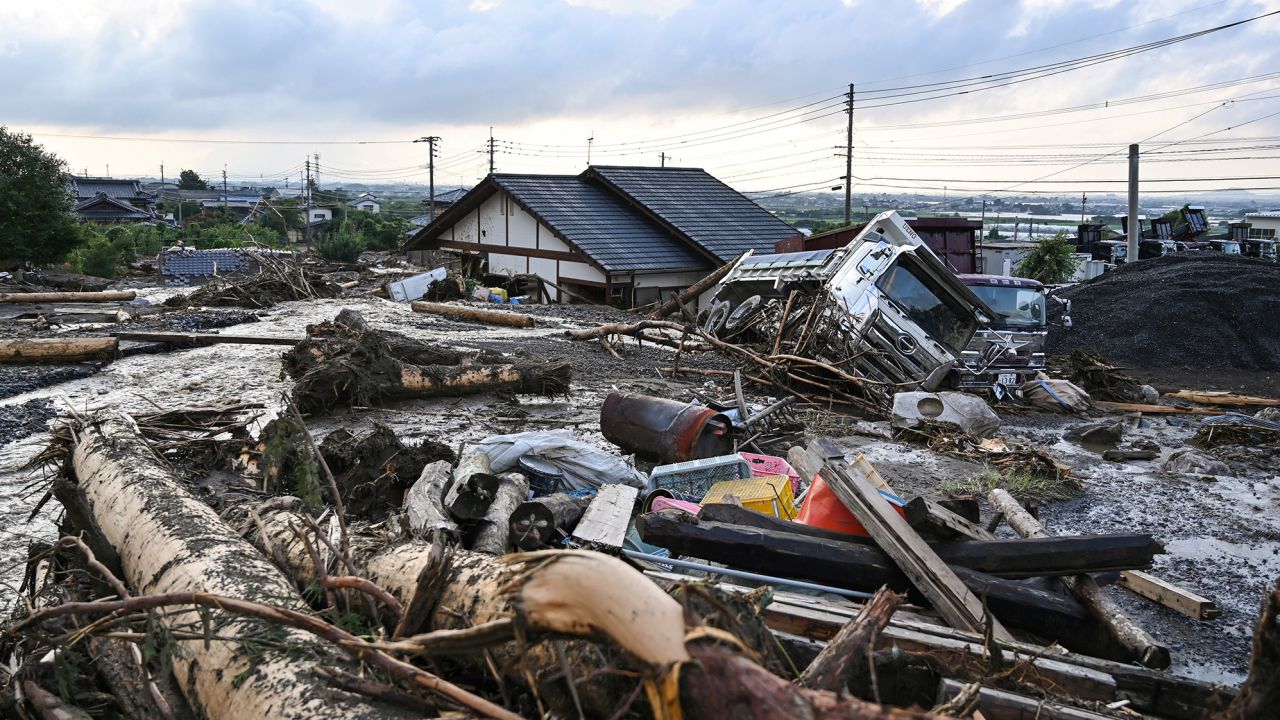 Debris from flooding sits in the road in the city of Kurume, Fukuoka prefecture, on July 10, 2023.