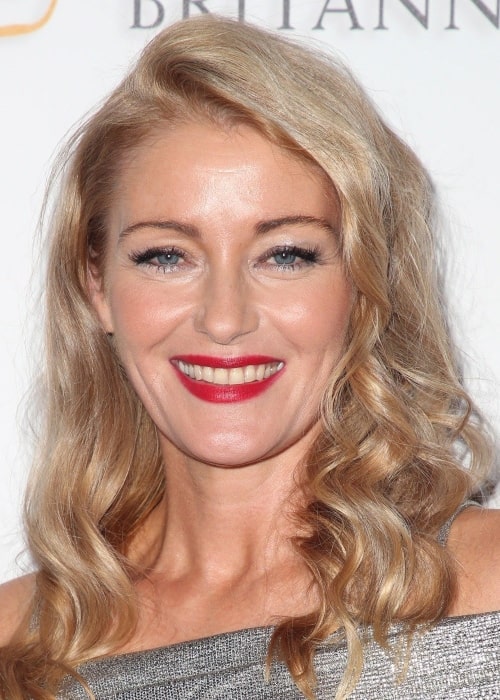 Louise Lombard as seen while smiling for the camera