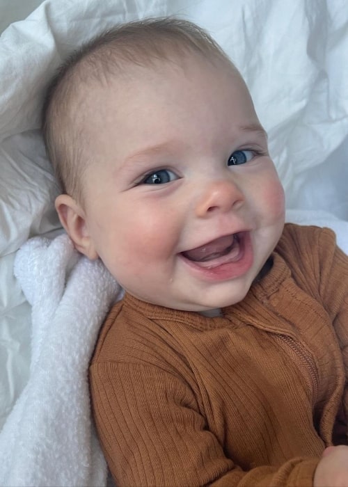 Poppy Herbert in a picture taken while smiling joyfully in October 2021