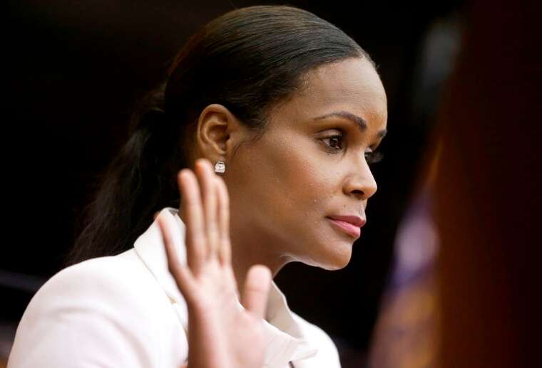 Tameka Foster Raymond takes the witness stand during a child custody hearing with her ex-husband, R&B singer Usher, Aug. 9, 2013, in Atlanta. Foster is calling to drain Lake Lanier, Georgia's largest lake, where her son was fatally injured 11 years ago. Kile Glover, her 11-year-old son with Bounce TV chairman Ryan Glover, died in July 2012 after a personal watercraft struck the boy as he floated in an inner tube on the lake.