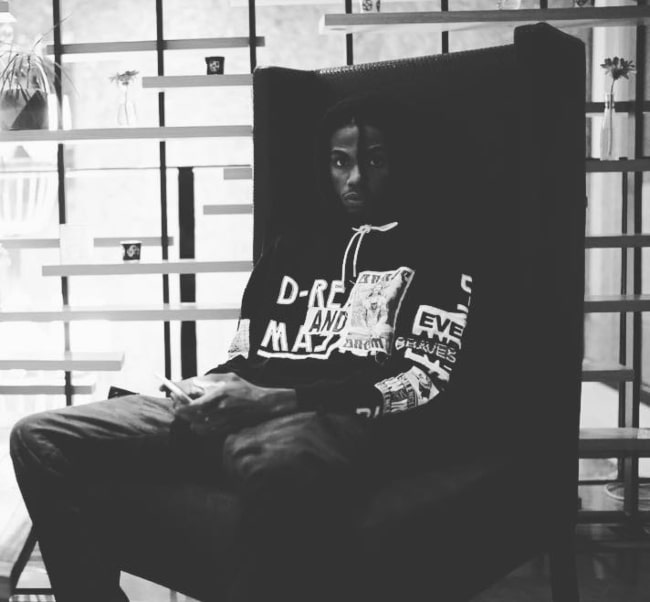 Alkaline as seen in a black-and-white still in September 2018