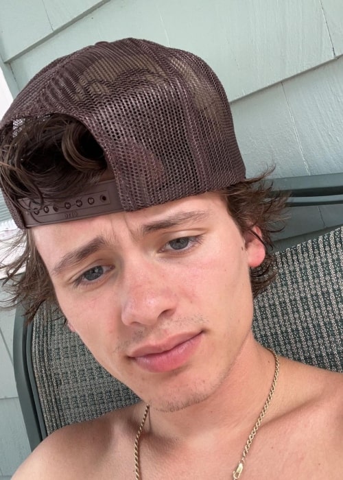 Nathan Doe as seen in a selfie that was taken at a pool party for pups in July 2023