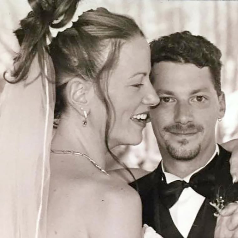 Lisa Ann Motto with her husband Doug on their wedding day.