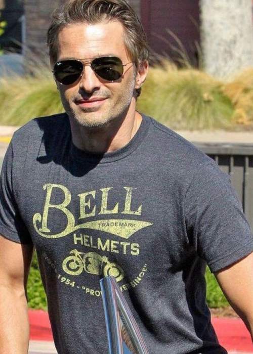 Olivier Martinez as seen smiling for a picture