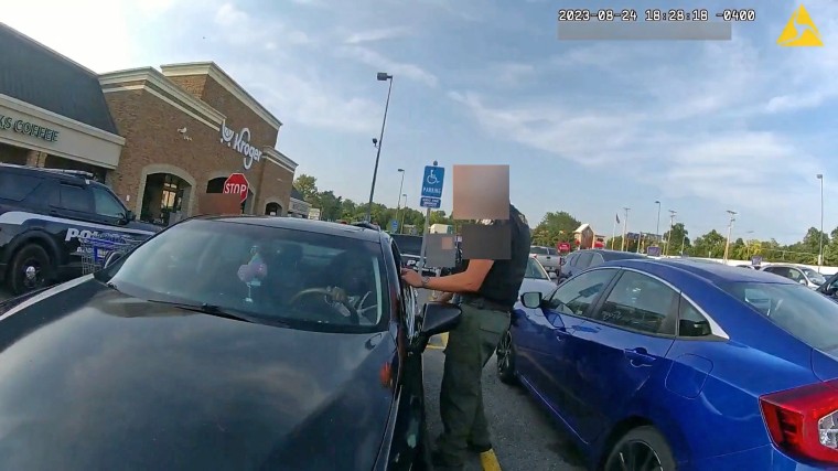 Body camera footage of police officers approaching Ta’Kiya Young