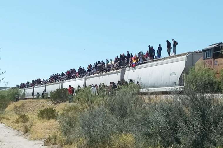 Migrants on top of a Ferromex train in Mexico.