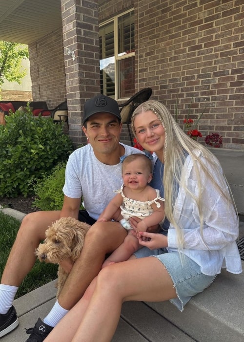 Brynley Arnold as seen in a picture with her family and their pet dog that was taken in May 2023