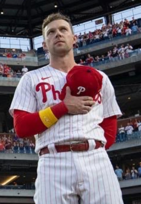 Rhys Hoskins with the Philadelphia Phillies as seen during the National Anthem before a game at Citizens Bank Park on September 10, 2022