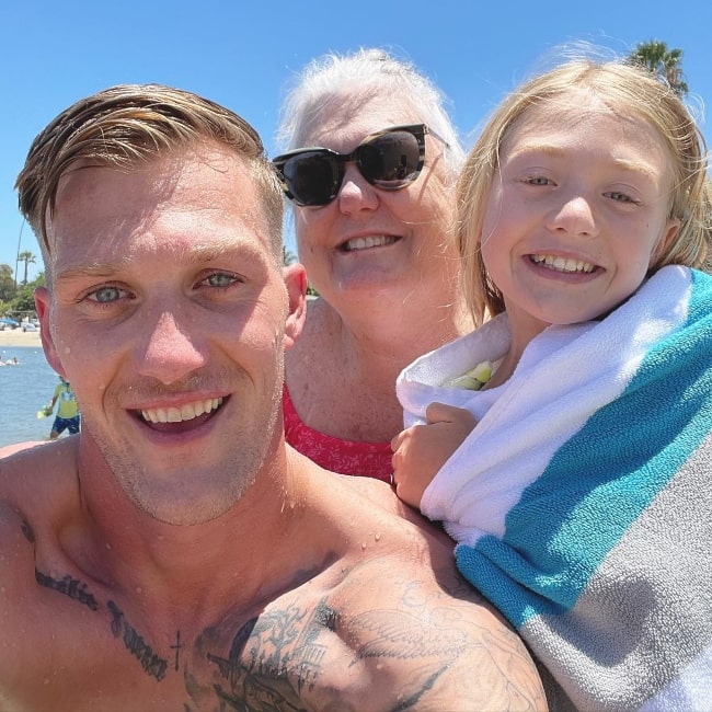 Tommy Smith as seen in a selfie with his daughter Everleigh and his mother in June 2022, while at Newport Beach, California