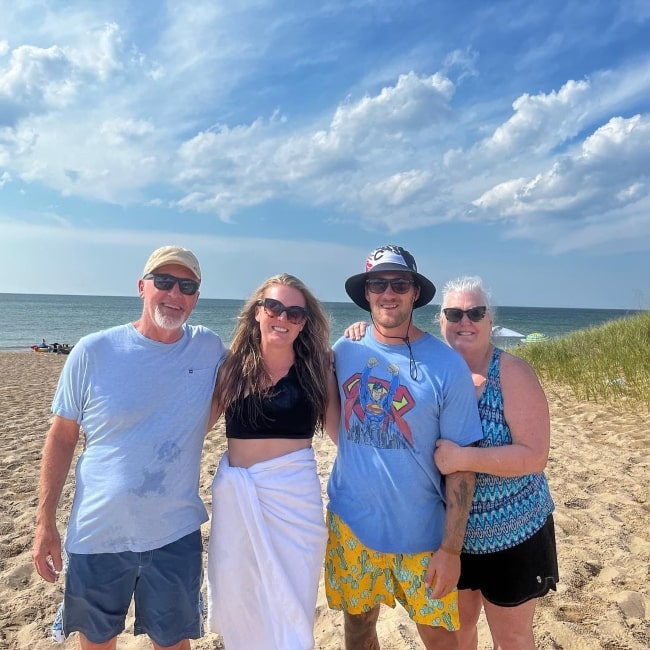 Tommy Smith as seen in a picture with his family that was taken in August 2022, at Jean Klock Beach, Lake Michigan