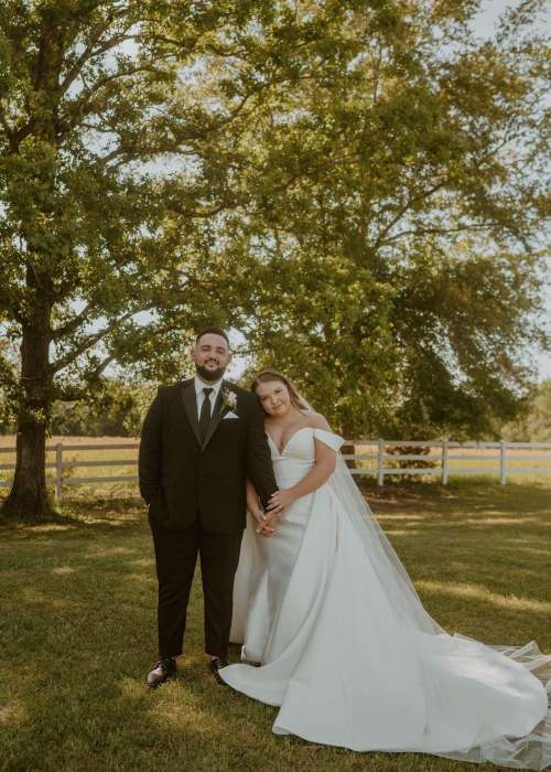 Will Robertson as seen with his bride Abby on their wedding day in April 2023