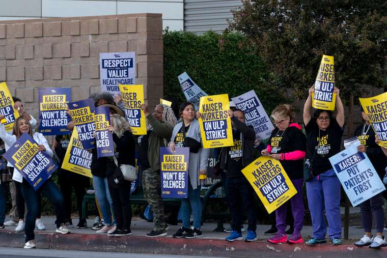 Kaiser Permanente workers strike outside a hospital in Los Angeles on Oct. 4, 2023.