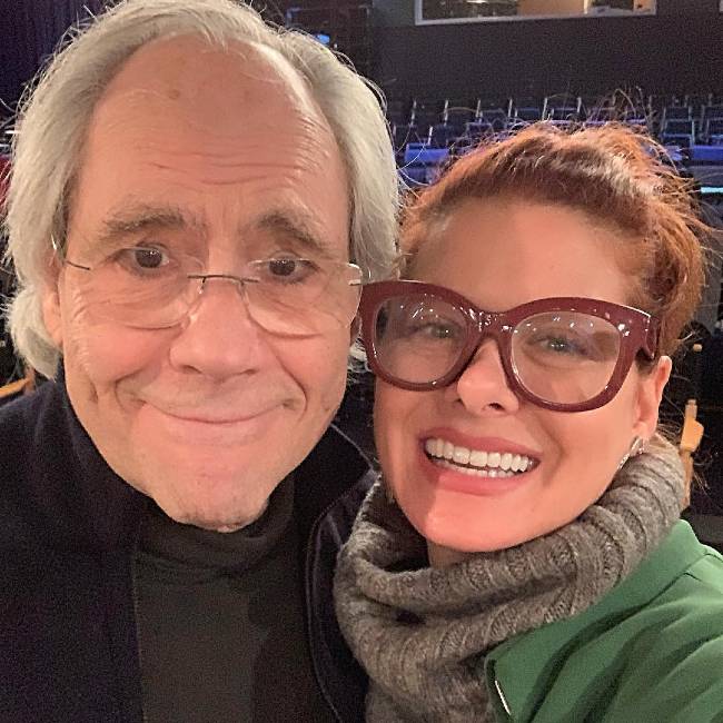 Robert Klein and Debra Messing seen taking an Instagram selfie together in 2018
