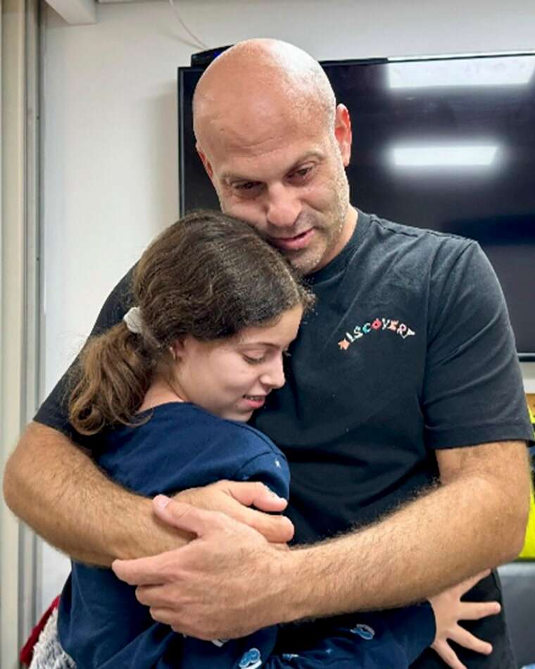 Image: Hila Rotem Shoshani, a released hostage, reunites with her uncle