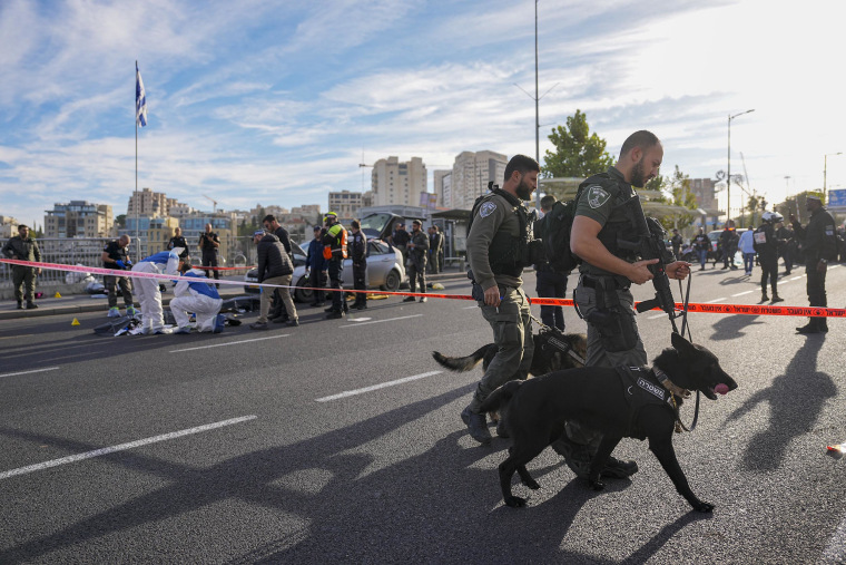 Israeli police said gunmen opened fire Thursday on people waiting for buses and rides along a main highway at the entrance of Jerusalem.