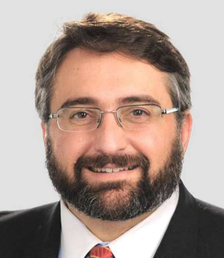 Portrait of Dr. Martin Palmeri smiling.