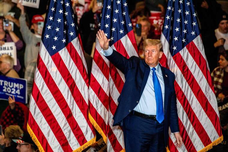 Former president and 2024 presidential candidate Donald Trump leaves after speaking at a campaign rally in Claremont, N.H.