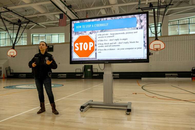 Police Teach 8th Grade Students About Internet Security And Cyberbullying At Middle School Event