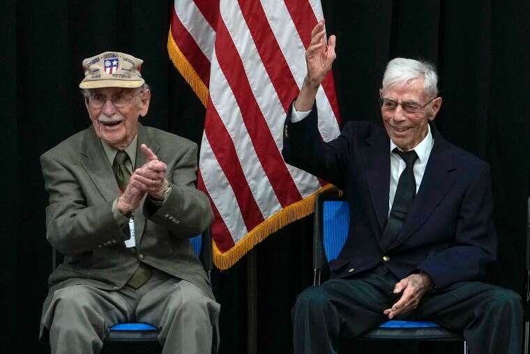 Harry Moyer, right, and Mel McMullen during a ceremony in honor of Flying Tigers