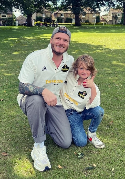 Matthew Wolfenden as seen while posing for a picture with his son in July 2023