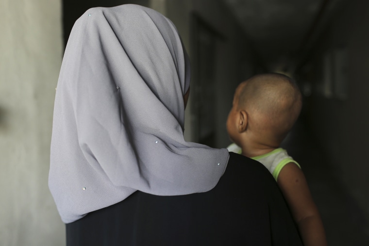 T left Bangladesh for Malaysia in 2022 for an arranged marriage with an older man. During her journey from Bangladesh, she was abused by a trafficker. She says her husband verbally abuses her and doesn't let her leave their apartment. 