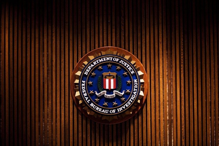 A crest of the Federal Bureau of Investigation is on Aug. 3, 2007 inside the J. Edgar Hoover FBI Building in Washington, DC.
