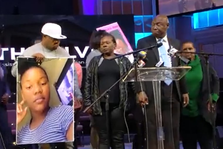 Ben Crump with members of Alegend Jones' family at the news conference.