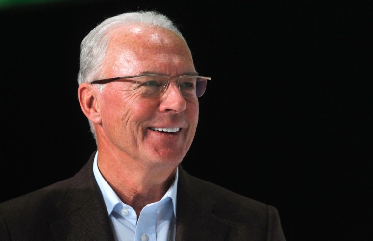 Franz Beckenbauer smiles during the FIFA Soccer World Cup award ceremony.