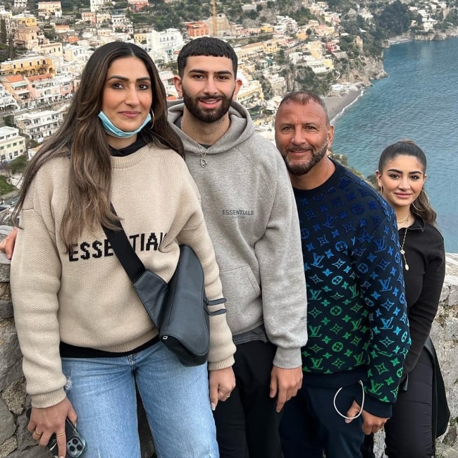 Coach Furrha as seen in a picture with his wife Salem and their children taken in March 2022, while visiting Positano