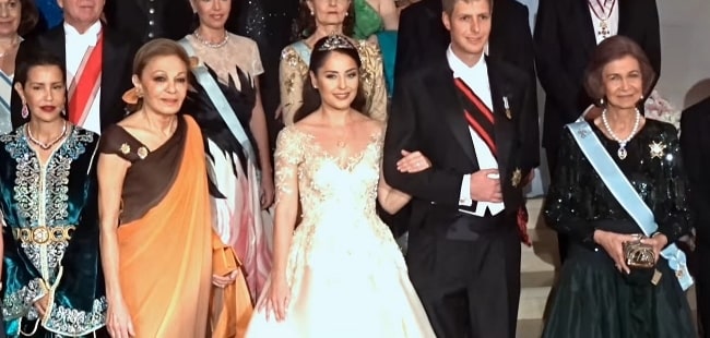 From Left - Princess Lalla Meryem of Morocco, Empress Farah of Iran, Elia Zaharia, Leka, and Queen Sofía of Spain posing for a picture during Elia and His Royal Highness Prince Leka of Albania's wedding