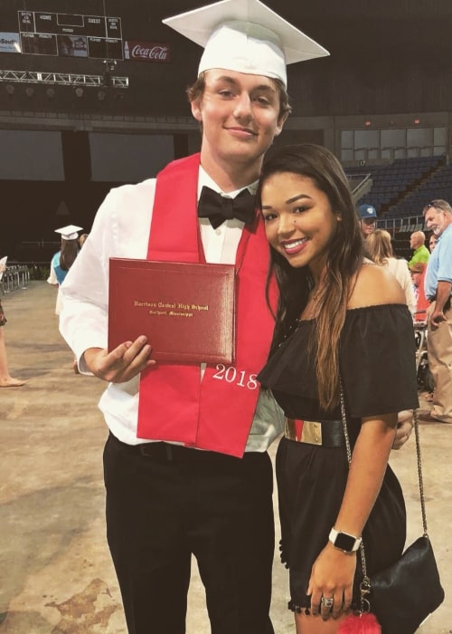Justin Coggins as seen in a picture with Serenity Moore taken on the day of his graduation in May 2018