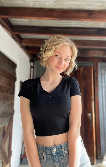 Lily Brooks O'Briant as seen while smiling for the camera in July 2022