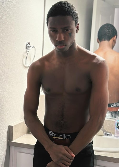 Thizzkid as seen in a shirtless picture that was taken in December 2023