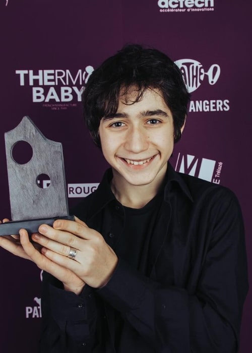 Milo Machado Graner as seen while smiling for the camera