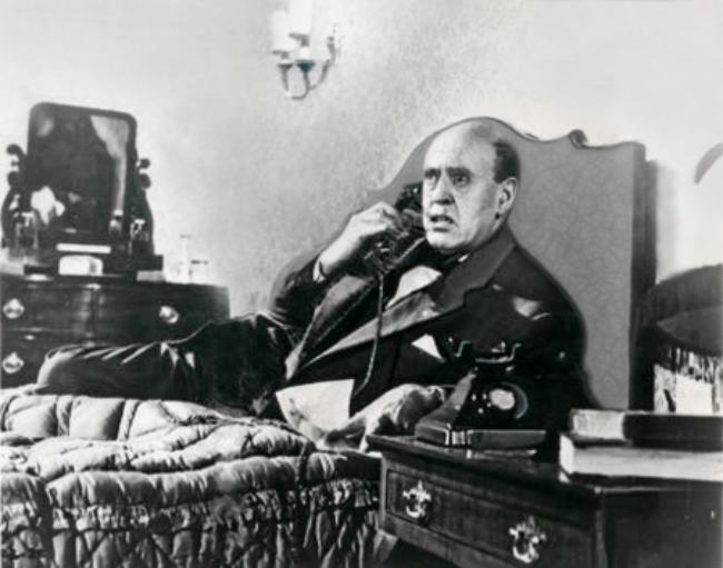 Alastair Sim seen in the 1956 film The Green Man