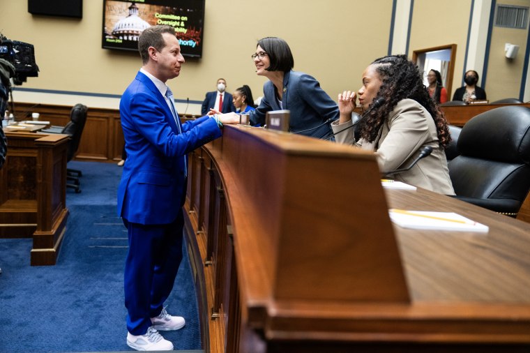 From left; Rep. Jared Moskowitz, D-Fla., talks to Becca Balint, D-Vt., and Summer Lee, D-Pa., in Washington, D.C. on May 16, 2023.