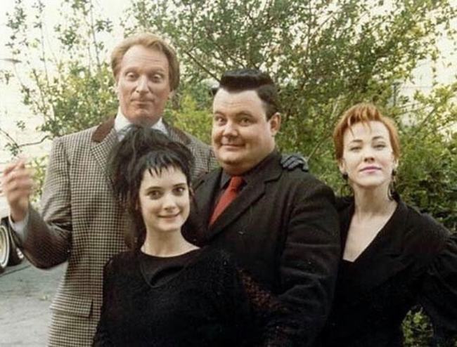 Jeffrey Jones as seen on the set of Beetlejuice with co-stars Winona Ryder, Catherine O'Hara, and Glenn Shadix