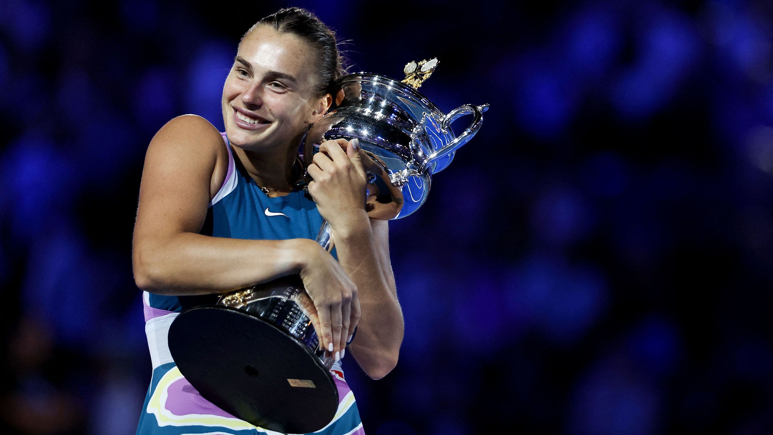 Belarus' Aryna Sabalenka poses with the trophy after winning against Kazakhstan's Elena Rybakina during the women's singles final on day thirteen of the Australian Open tennis tournament in Melbourne on January 28, 2023.