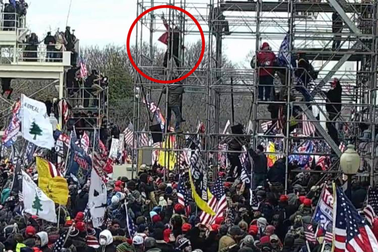 The man identified as Banuelos seen appearing to fire a weapon in Capitol CCTV footage.