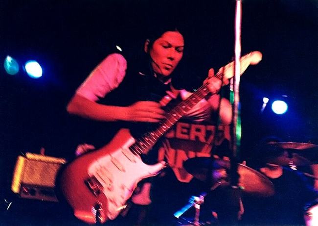 Kim Deal as seen in concert with the Amps in 1995