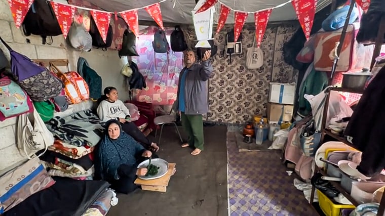 Handmade Ramadan decorations hang from the ceiling of the Sbeta family home