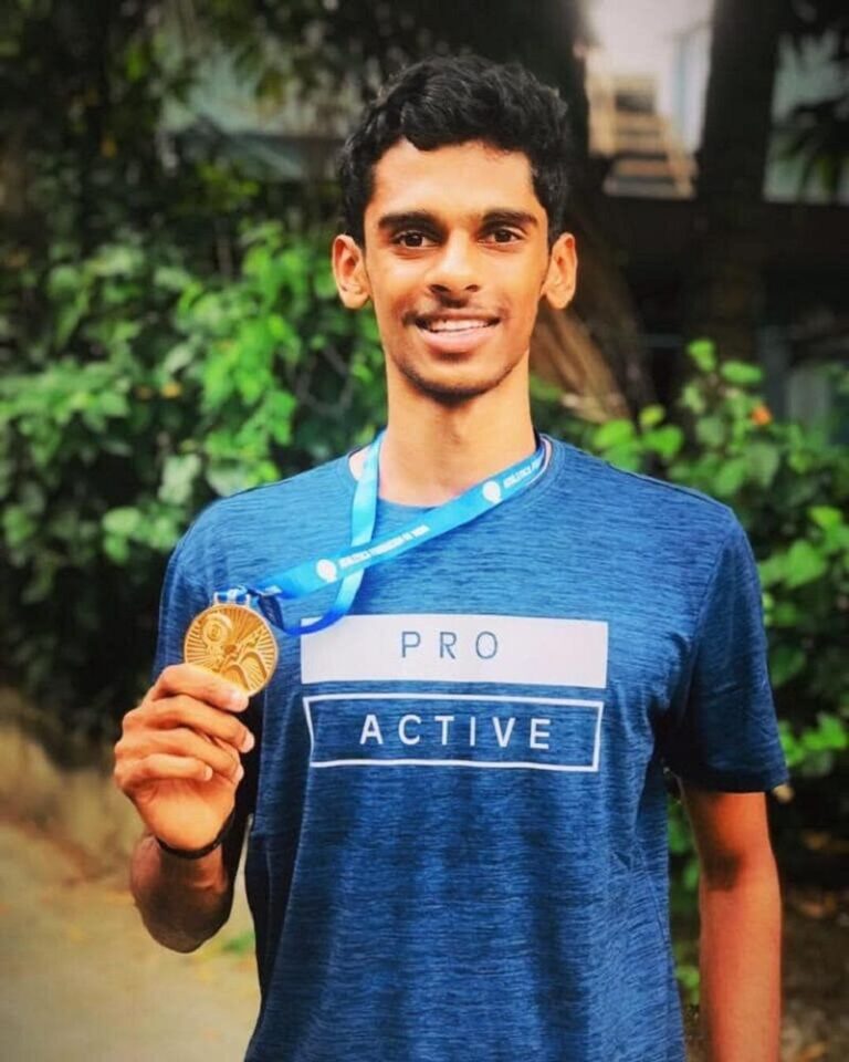 Murali Sreeshankar posing with a medal