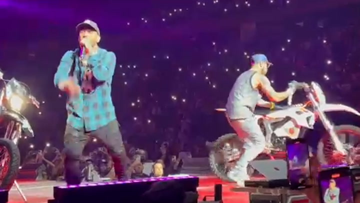Moment rapper accidentally launches motorbike off stage and into crowd during concert