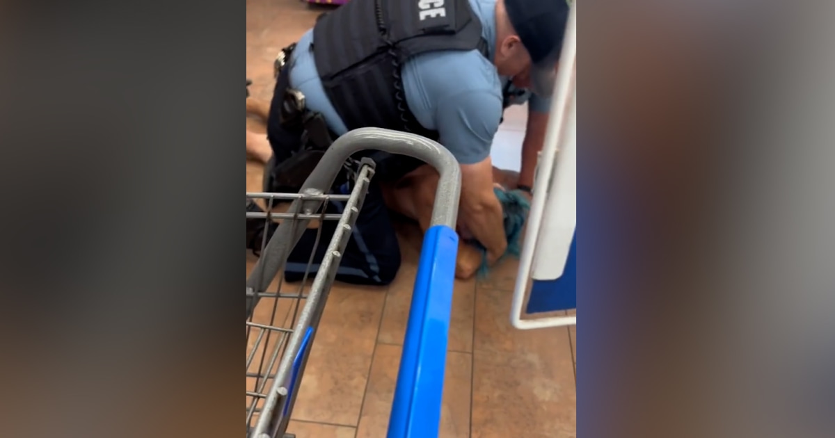 Video shows a man held down by police in a Kansas City Walmart