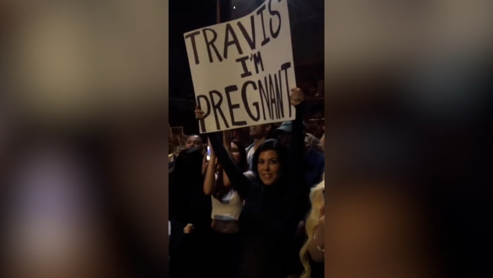 Kourtney Kardashian reveals pregnancy at Blink-182 concert after documenting IVF journey