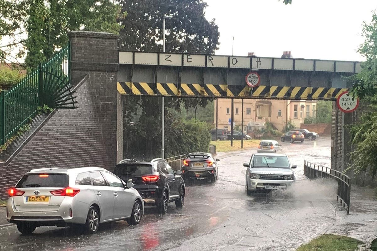 Flood warnings issued after half a month’s rain falls in one hour