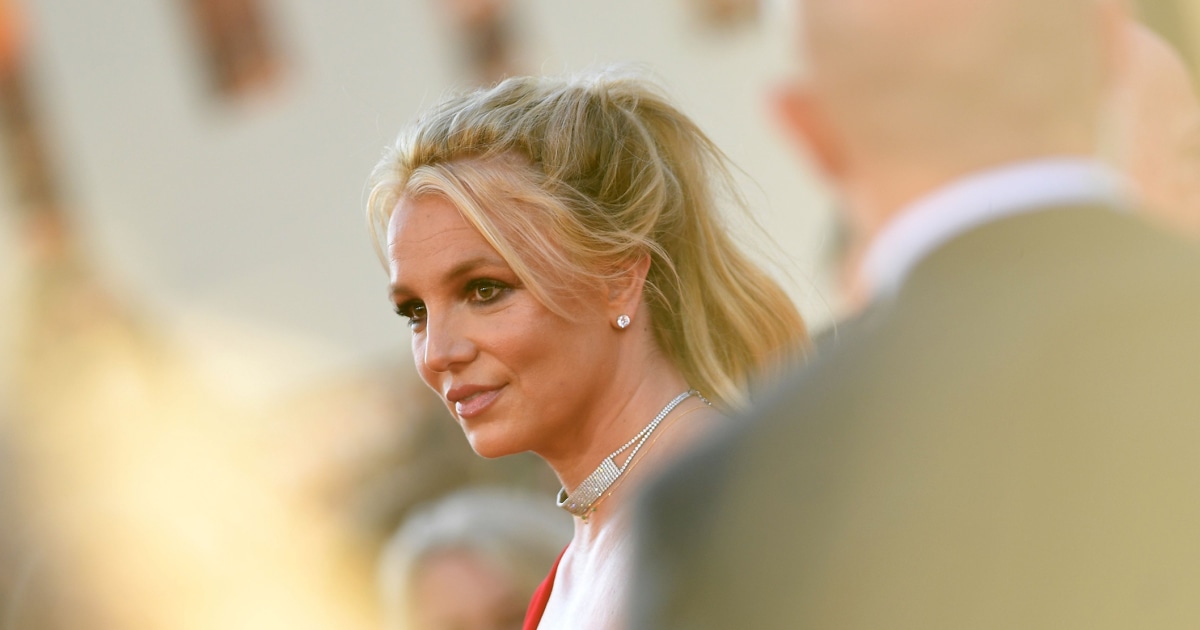 Video shows Britney Spears inadvertently hit herself in the face in Las Vegas Wembanyama encounter